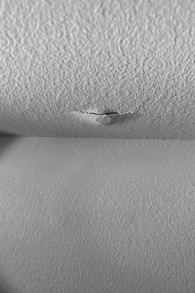 you see a nail pop in a ceiling