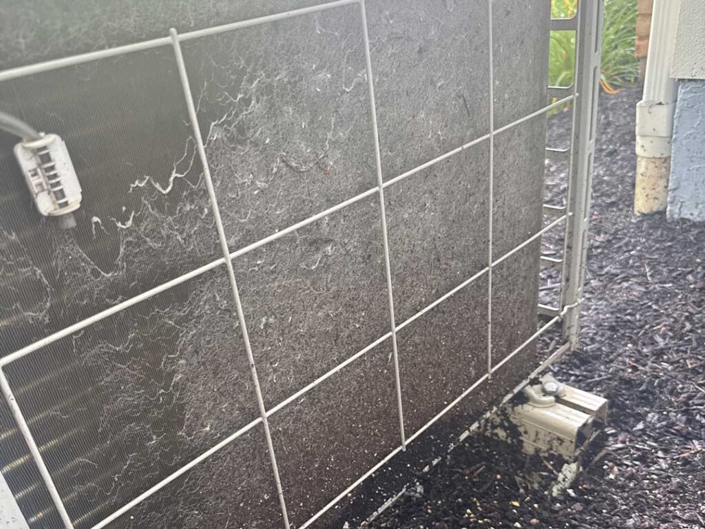dirty-air-conditioner-condenser-coil-restricted-airflow