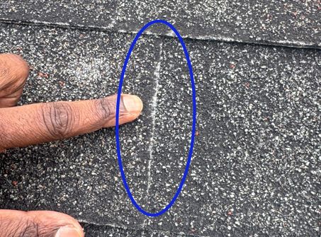 Granule loss on asphalt shingles observed during a home roof inspection