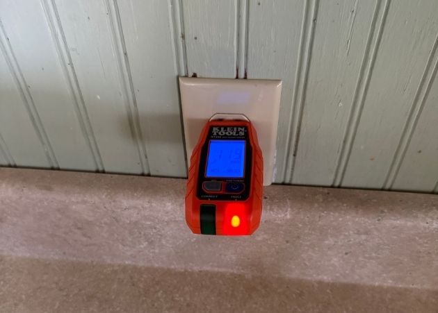 Electrical outlet being tested during a Columbus home inspection