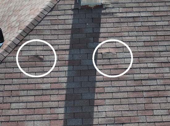 Nail pops and exposed fasteners identified during a residential roof inspection