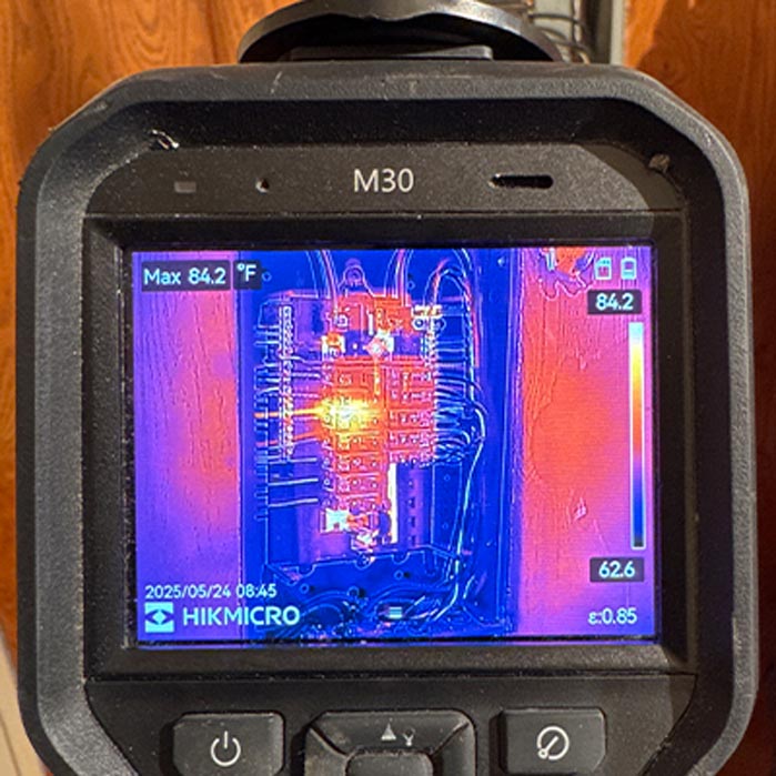 Thermal imaging camera showing a hot spot on an electrical panel during a Columbus, Ohio home inspection